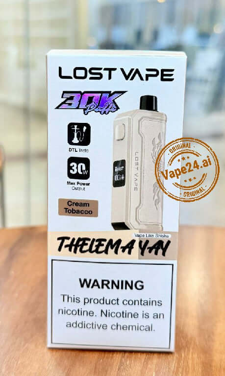 Lost Vape Thelema YAY DTL Disposable Vape packaging featuring Cream Tobacco flavor and warning about nicotine.