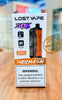 Lost Vape Thelema YAY 30K Puffs Disposable Vape in Orange Blueberry flavor with warning label.
