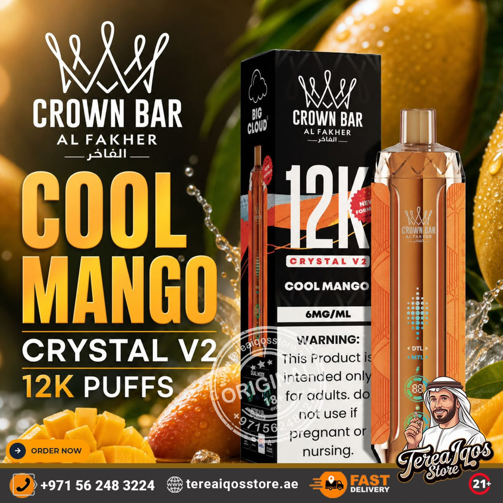 Al Fakher Crown Bar Big Cloud Crystal V2 Cool Mango disposable vape device and its black packaging box, set against a dynamic background of fresh mangoes and water splashes. The image features promotional text overlays and store contact details.
