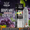Promotional product graphic for Crown Bar Al Fakher Crystal V2 Grape Mint disposable vape and its packaging, shown alongside grape imagery and large text reading 'Grape Mint 12K Puffs' and '12K Puffs'.