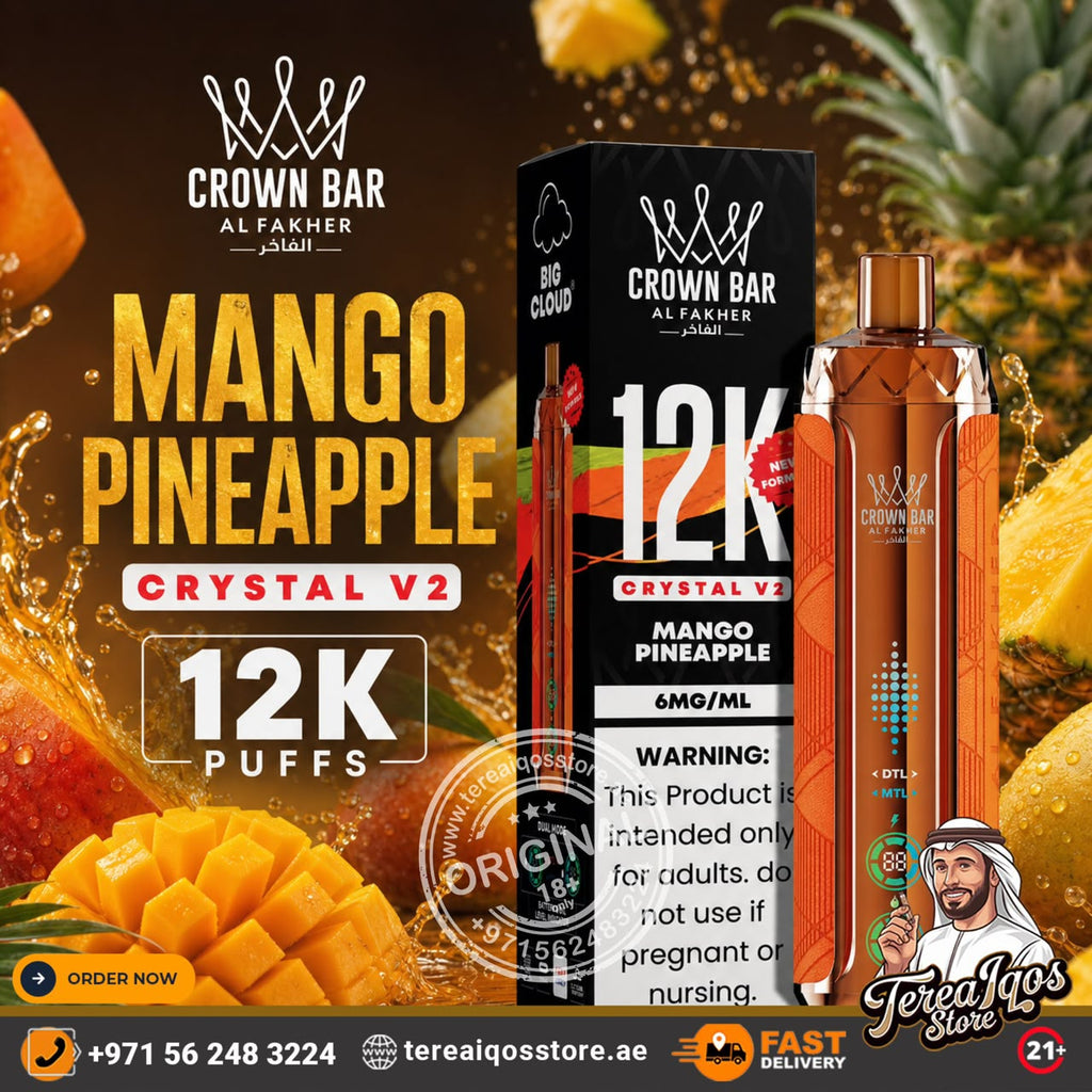 Crown Bar Al Fakher Crystal V2 Mango Pineapple disposable vape and its packaging box, set against a dynamic background of sliced mangoes, pineapples, and golden liquid splashes. The ad includes promotional text, a customer phone number, and a Tereilqos Store logo.