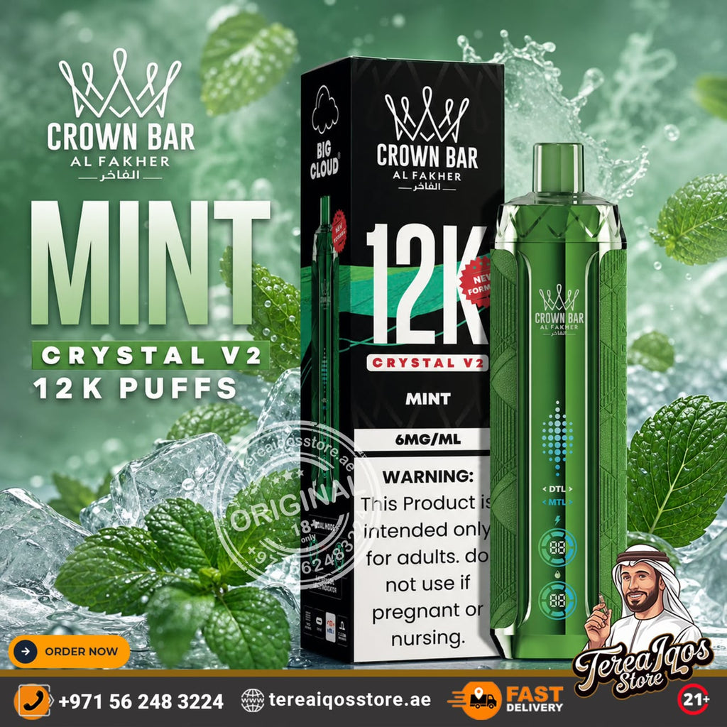 Crown Bar Alfakher Mint Crystal V2 disposable vape and its packaging box, set against a green mint leaf and ice splash background. The ad includes branding, product details, and a store contact banner.