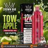 Promotional product graphic for Crown Bar Al Fakher Tow Apple Crystal V2 disposable vape and its packaging, shown alongside green apple imagery and large text reading 'TOW APPLE', 'CRYSTAL V2', and '12K PUFFS'.