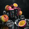 BLVK Bar Disposable 20000 Puffs Vape in Passion Peach flavor with product packaging, surrounded by peaches and ice cubes