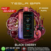 Tesla Bar vape device with black cherry flavor on a colorful background, featuring Vape24.ai branding.