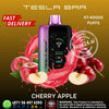Tesla Bar vape device with cherry and apple graphics on a brown background
