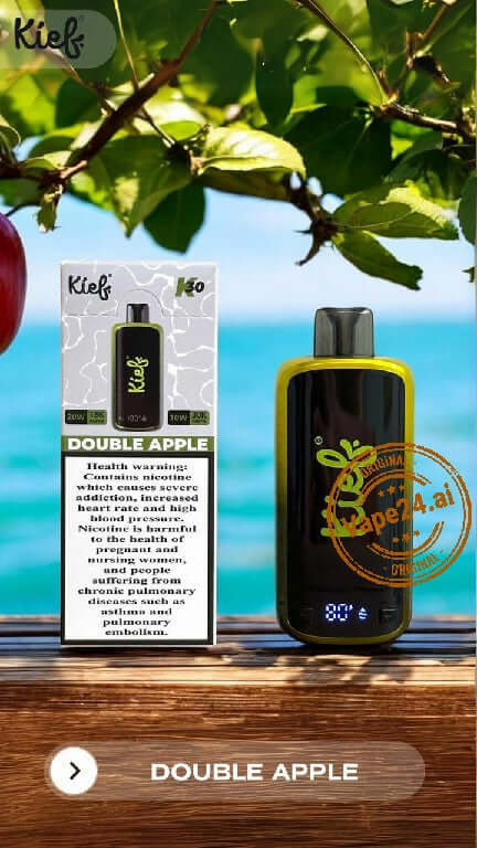 KIEF Double Apple disposable vape surrounded by greenery with packaging in background, showcasing vibrant design and flavor.