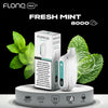 Flonq Max S Fresh Mint 8000 vaping device and packaging with mint leaves on a black background