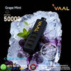 VAAL vape device on a rock with grapes and mint leaves, featuring the brand logo and product details.
