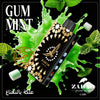 Zahab vape device with 'Gum Mint' flavor on a black background with green splashes and mint leaves.