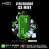 Green HQD vape device with ice and mint leaves on a black background