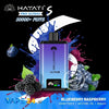 Hayati Pro Ultra+ vape device with blueberry and raspberry graphics on a colorful background