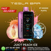 Tesla Bar vape device with juicy peach ice flavor on a brown background