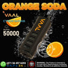Vape device with 'Orange Soda' flavor branding on a black background with orange slices.