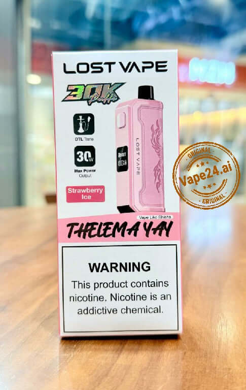 Lost Vape Thelema YAY 30K Puffs Disposable Vape box featuring Strawberry Ice flavor, with warning label.