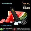 VAAL vape device with watermelon slices and ice cubes on a black background